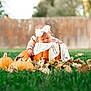 Laney is registered to the contest to win money with this photo: baby, pumpkin, fall, leaves, grass, outdoor, sleeping, headband, child, nature, autumn, cute, infant, seasonal, relaxing, yard, soft_clothing, holiday, portrait, peaceful