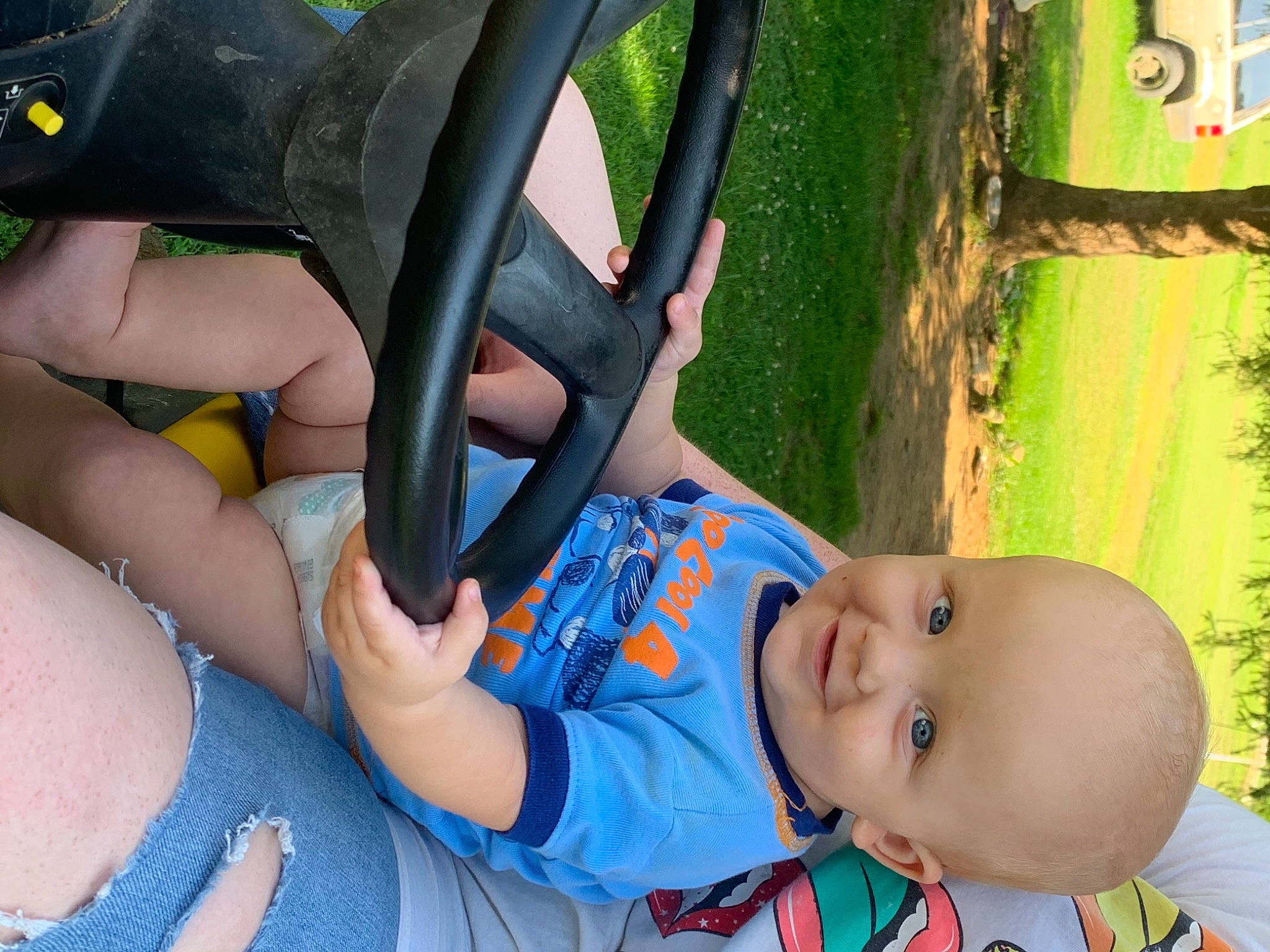 Arlow is registered to the contest to win money with this photo: baby, baby_toddler_clothing, fun, grass, hand, happy, hat, joy, leaf, leisure, people_in_nature, person, photograph, plant, product, recreation, smile, summer, toddler, tree