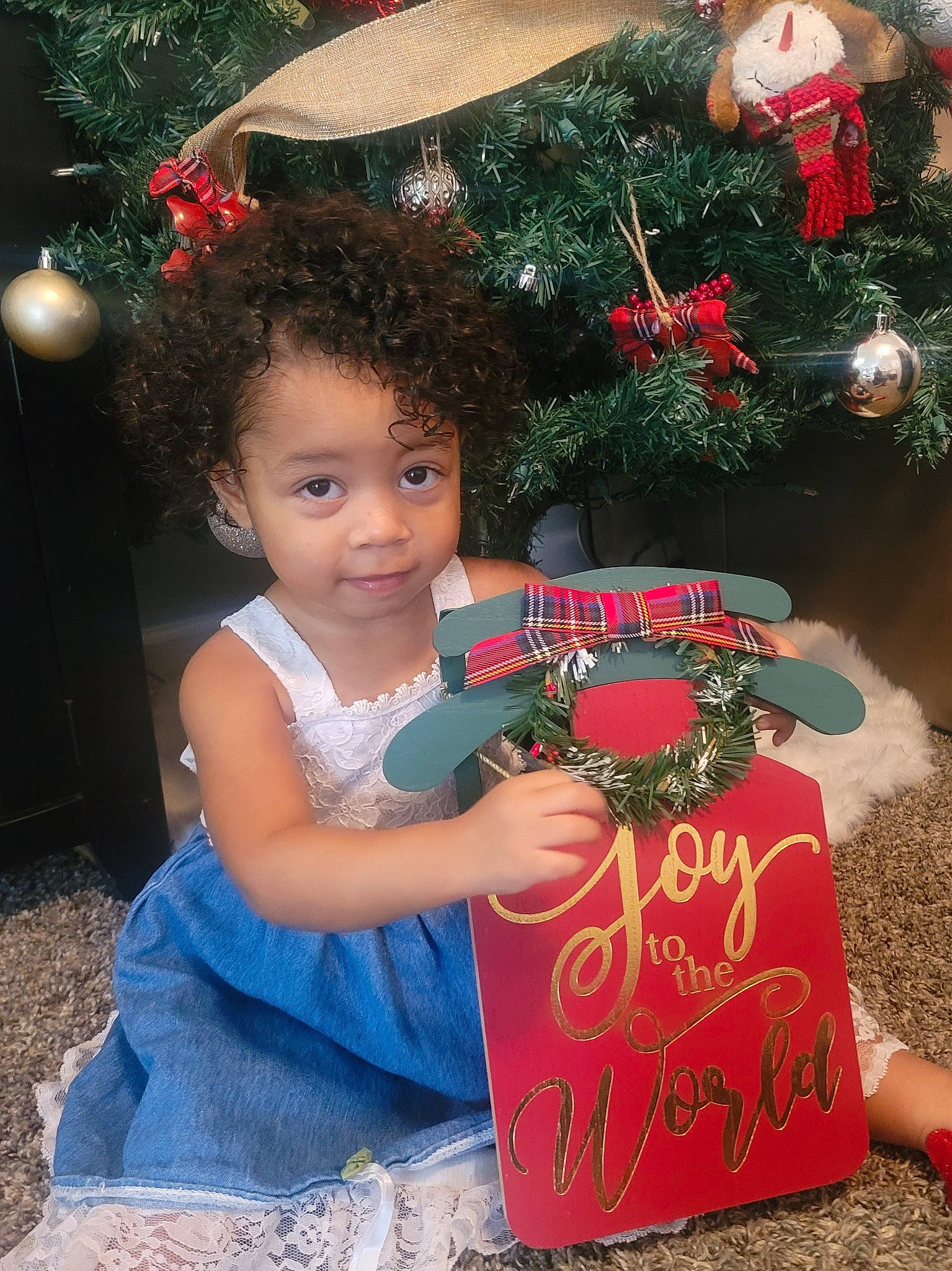 Elisa joined the competition — help win amazing prizes! child, christmas, christmas_decoration, christmas_eve, christmas_ornament, christmas_tree, conifer, event, evergreen, facial_expression, grass, handwriting, happy, holiday, holiday_ornament, interior_design, nature, ornament, person, toddler