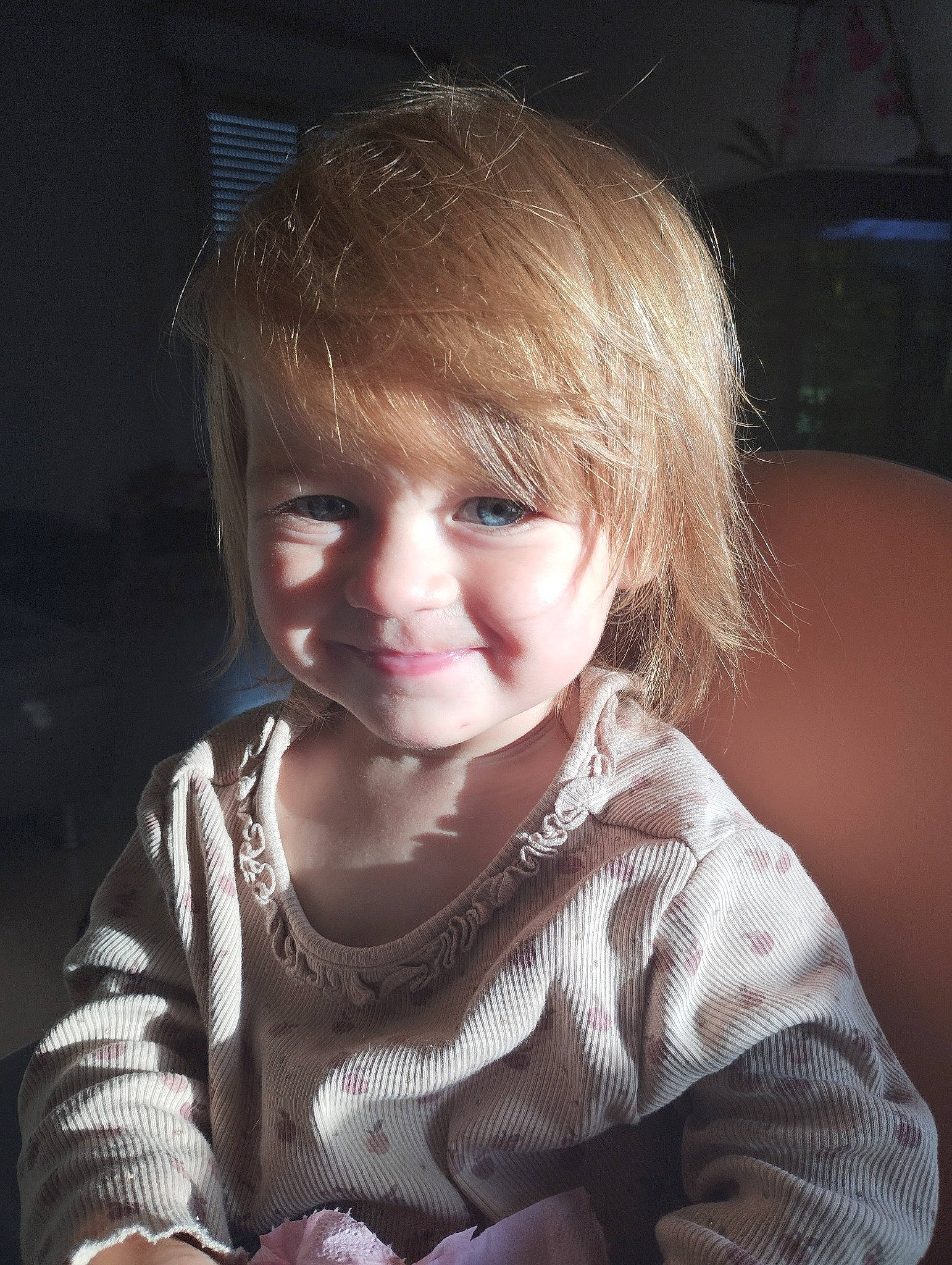 Kassie participe au concours pour gagner de l'argent avec cette photo : baby_toddler_clothing, blond, cheek, child, chin, face, flash_photography, fun, happy, iris, joy, lip, mouth, nose, person, sitting, skin, sleeve, smile, toddler