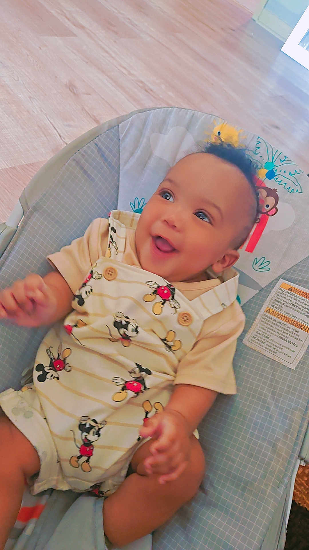 Mckayden is registered to the contest to win money with this photo: apparel, baby, baby_boy, baby_seat, child, clothing, cushion, cute, expression, happy, indoor, infancy, infant, joyful, mickey_mouse, person, playful, portrait, seat, smiling