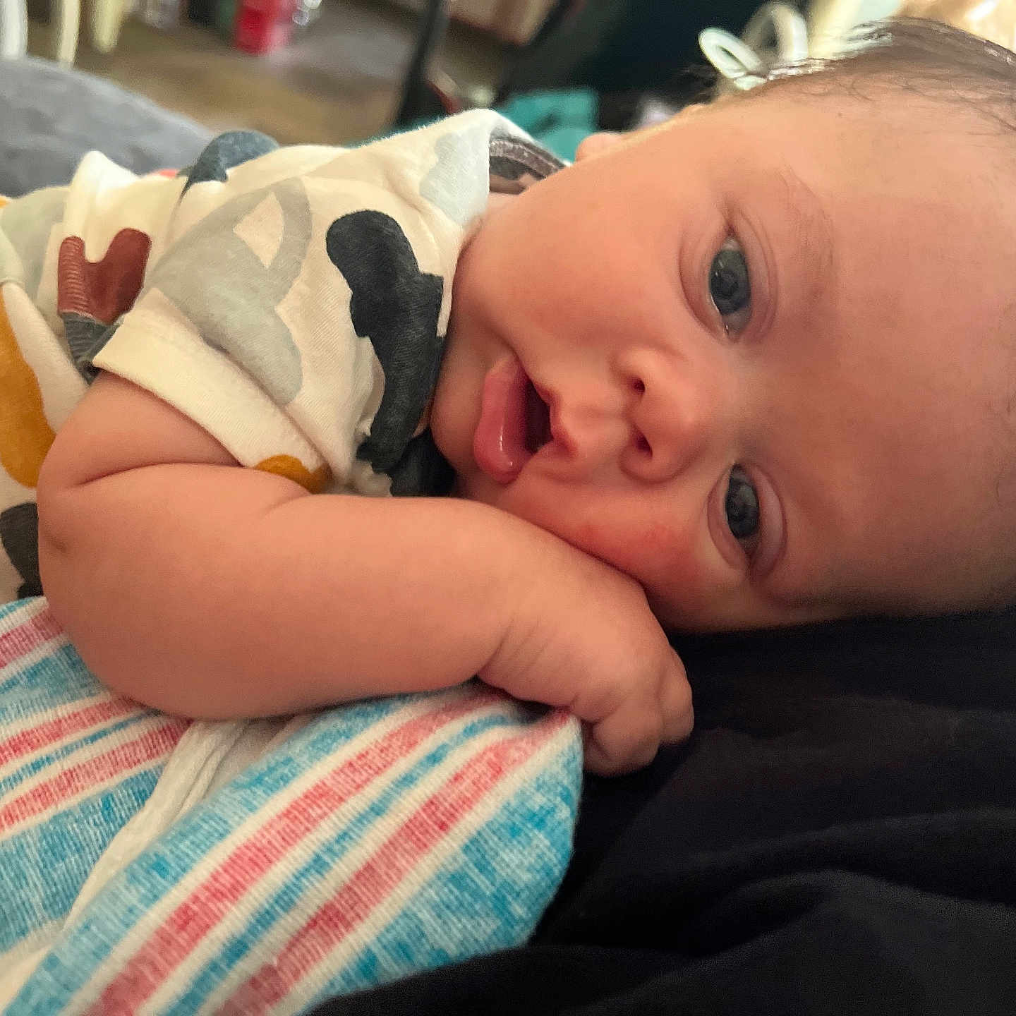 Gregory is registered to the contest to win money with this photo: architecture, baby, blanket, bodypart, building, clothing, cushion, face, finger, hand, happy, head, homedecor, hospital, newborn, person, photography, portrait, quilt, smile