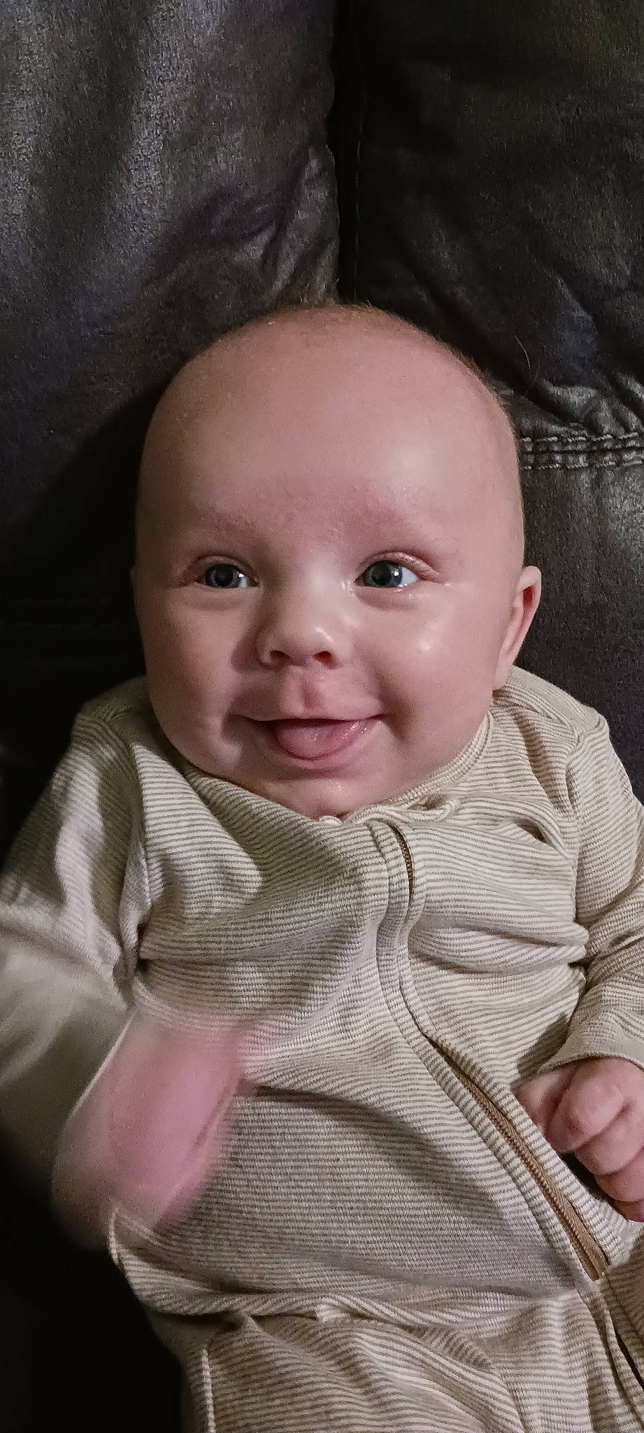 Anakin is registered to the contest to win money with this photo: baby, baby_toddler_clothing, cheek, chin, collar, comfort, ear, eyebrow, finger, gesture, happy, iris, joy, lip, mouth, neck, nose, person, skin, sleeve