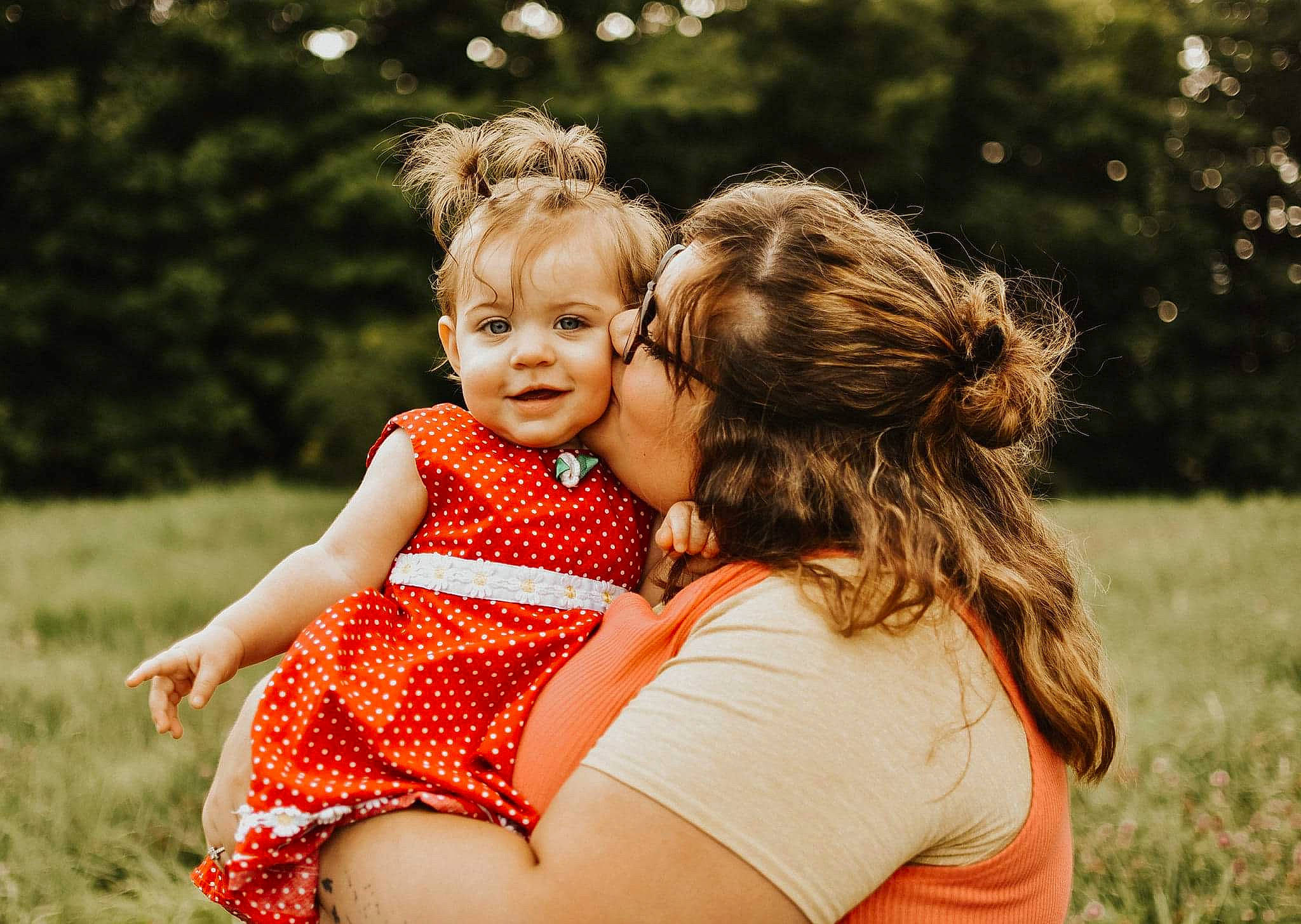 Maeleigh is registered to the contest to win money with this photo: baby, blond, child, dress, fun, grass, happy, interaction, mother, people, people_in_nature, person, photograph, photography, red, skin, smile, spring, summer, toddler