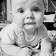 Allie joined the competition — help win amazing prizes! baby, infant, child, black_and_white, close_up, face, hands, eyes, cute, indoor, rug, texture, clothing, toy, furniture, portrait, expression, crawling, young, person