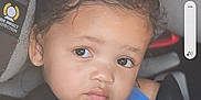 Amilliana is registered to the contest to win money with this photo: toddler, child, car_seat, seatbelt, blue_clothing, person, face, hair, eyes, skin, expression, safety, vehicle_interior, shoulder, young_child, portrait, indoors, straps, closeup, cute
