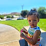 Amilliana is registered to the contest to win money with this photo: child, toddler, outdoor, sunny, grass, bubble_wand, rainbow_striped_shirt, tank_top, curly_hair, portrait, summer, play, young_child, casual_clothing, daylight, sidewalk, park, greenery, expression, person