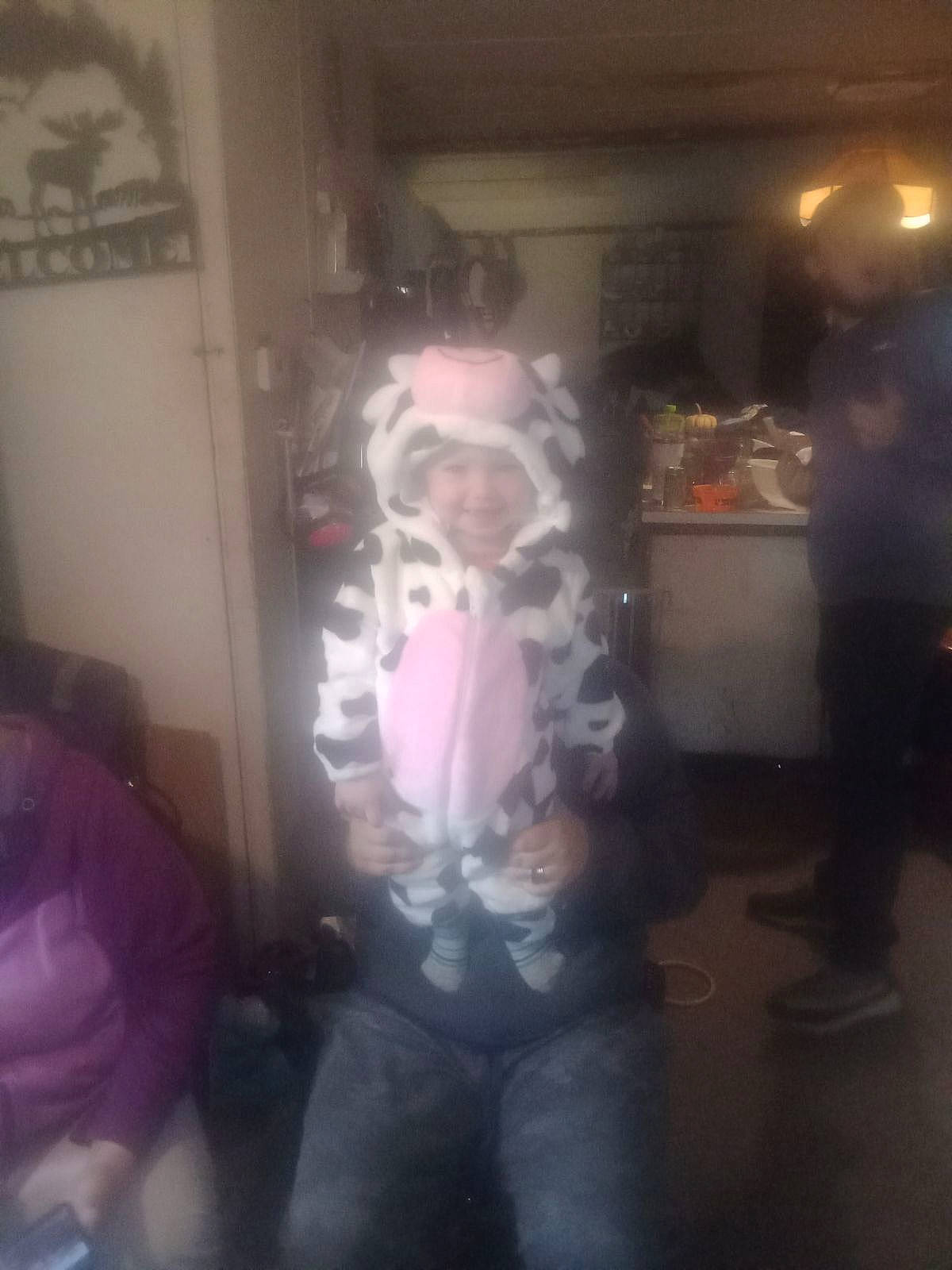 Winchester is registered to the contest to win money with this photo: blurred, costume, darkness, event, fictional_character, fun, fur, joy, person, personal_protective_equipment, room