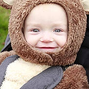 Donald is registered to the contest to win money with this photo: toddler, child, costume, bear, cute, smile, face, eyes, outdoor, baby, fuzzy, ears, clothing, portrait, happy, closeup, person, infant, warm, funny