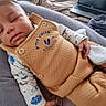 Liam participe au concours pour gagner de l'argent avec cette photo : baby, sleeping, infant, clothing, cushion, blanket, laptop, hand, foot, face, indoor, relaxing, cozy, soft, person, child, cute, peaceful, home, resting