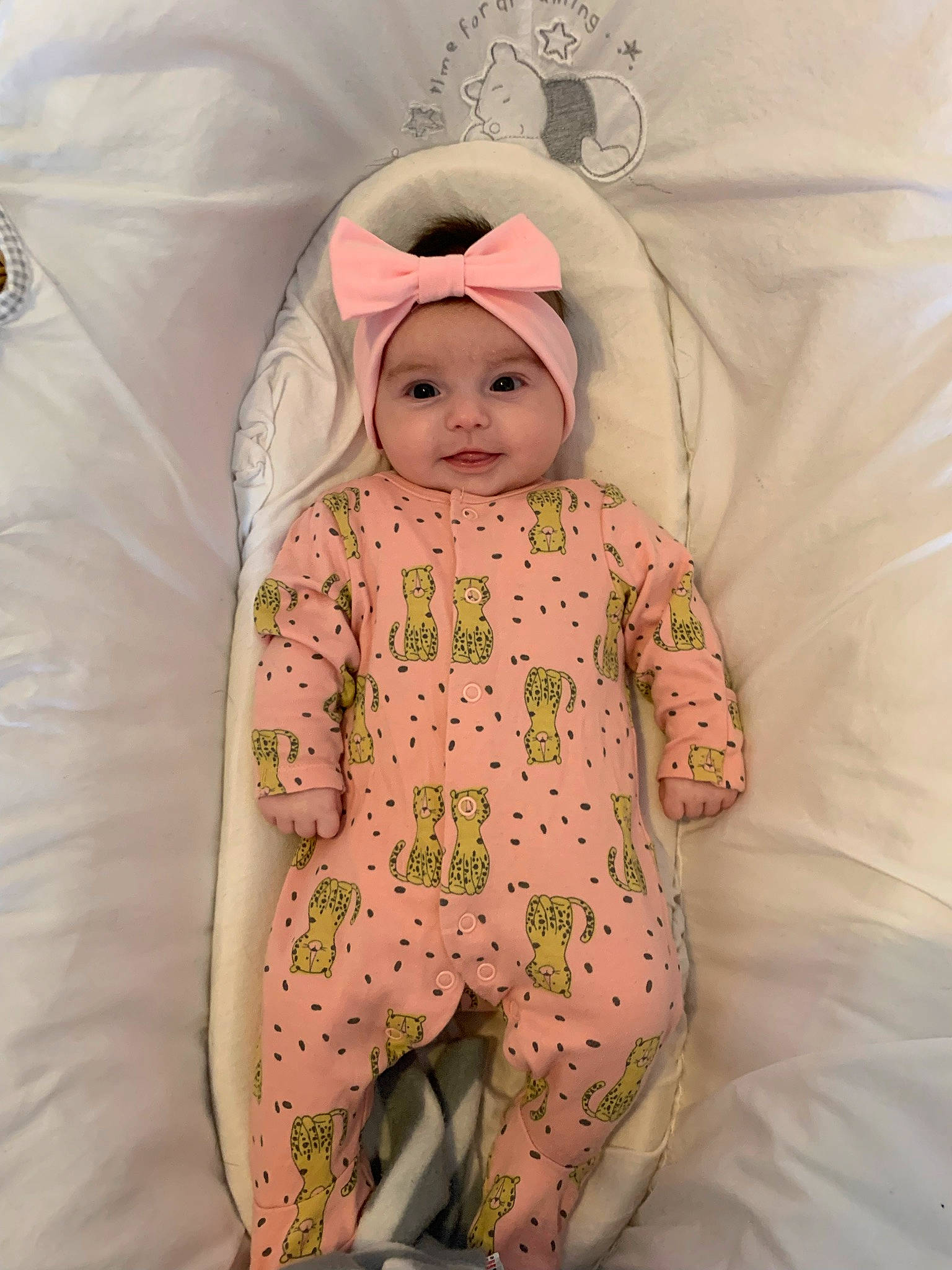 Karina joined the competition — help win amazing prizes! baby, baby_products, baby_safety, baby_sleeping, baby_toddler_clothing, bedding, cheek, comfort, eye, happy, headwear, linens, pattern, peach, person, pink, room, sitting, sleeve, smile