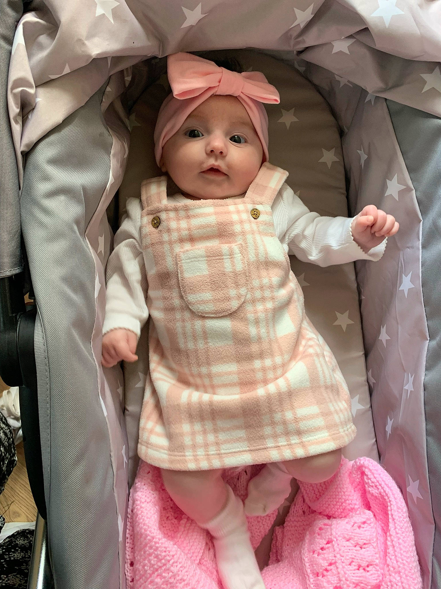 Karina is registered to the contest to win money with this photo: baby, baby_carriage, baby_products, baby_safety, baby_toddler_clothing, cheek, child, comfort, doll, eyelash, fashion_accessory, headwear, linens, pattern, person, pink, product, skin, sleeve, toddler