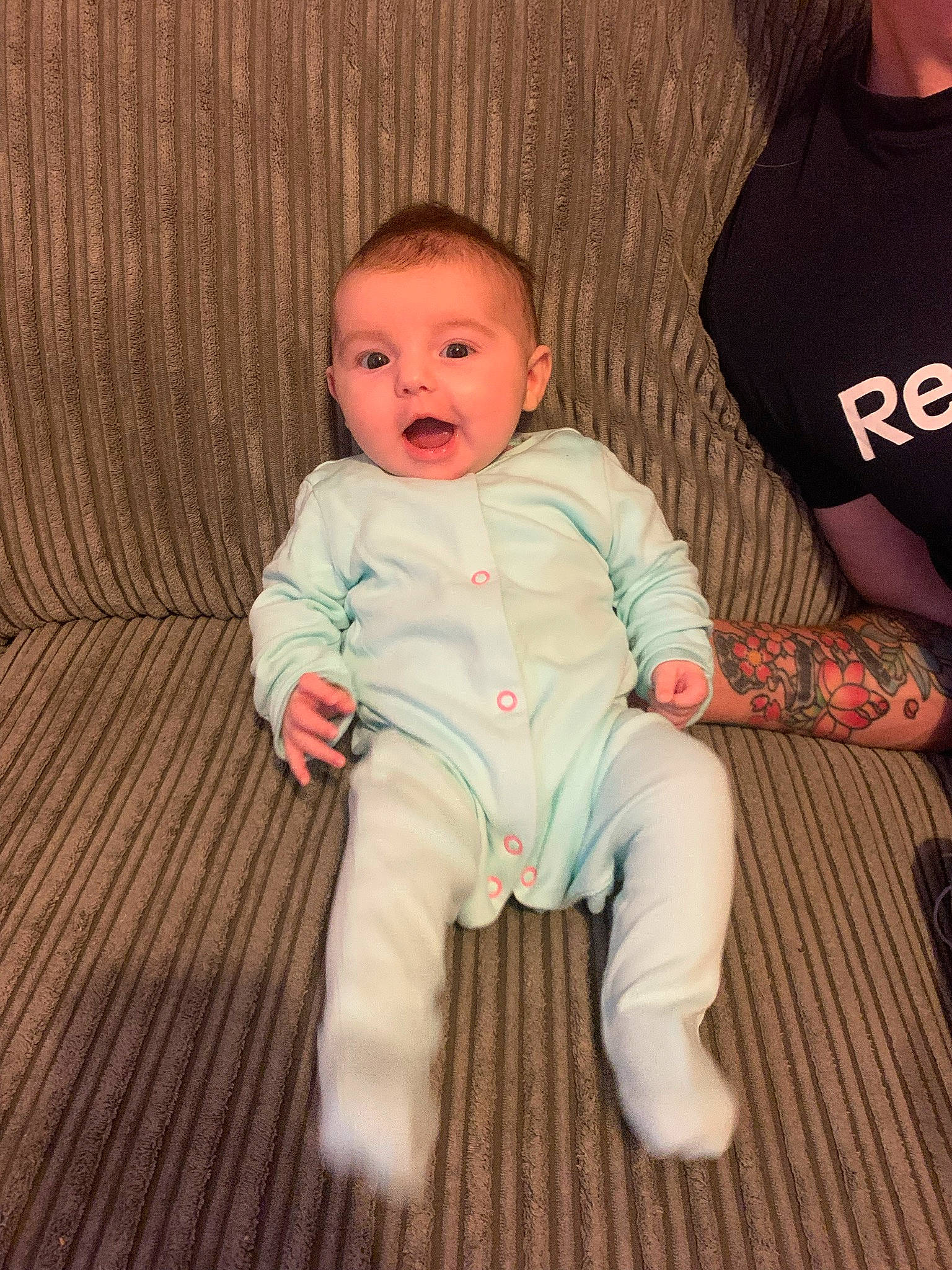 Karina is registered to the contest to win money with this photo: arm, baby, baby_toddler_clothing, cheek, comfort, facial_expression, finger, happy, human, human_body, leg, mammal, nose, person, product, skin, sleeve, smile, standing, textile
