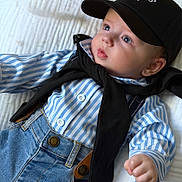 Brays joined the competition — help win amazing prizes! baby, child, blue_eyes, striped_shirt, denim_overalls, black_cap, black_sweater, infant, cute, portrait, lying_down, clothing, buttoned_shirt, fashion, face, hand, white_background, casual, young_child, hat