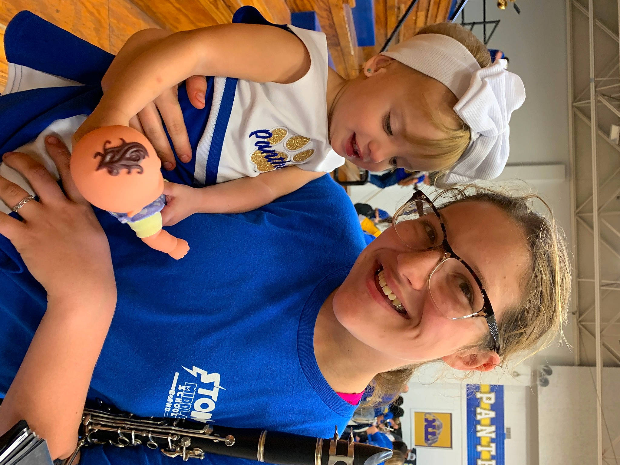 Alexis is registered to the contest to win money with this photo: blue, chest, child, elbow, electric_blue, event, fun, gesture, happy, human_body, joy, leisure, mouth, muscle, organ, person, shorts, shoulder, smile, t_shirt