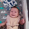 Jaimalyn joined the competition — help win amazing prizes! baby, smiling, crib, blanket, whale_pattern, elephant_pattern, dress, bow, child, infant, happy, cute, toddler, fabric, plush, mesh_sides, indoor, person, laying, face