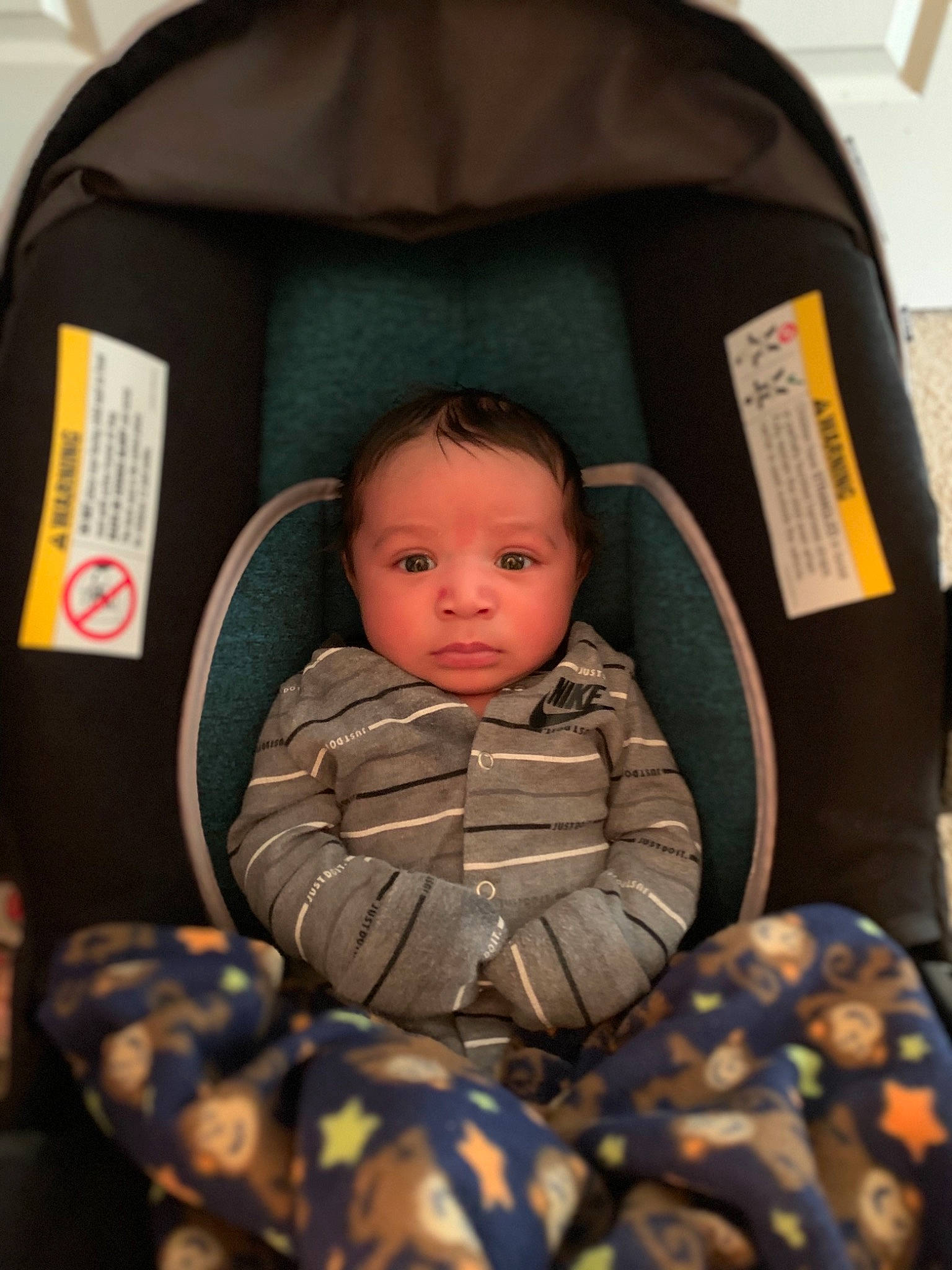 Jermaine is registered to the contest to win money with this photo: army, baby, baby_carriage, baby_products, baby_toddler_clothing, camouflage, car_seat, child, comfort, eye, human_body, infant_bed, jacket, military_camouflage, military_person, military_uniform, person, product, sleeve, soldier