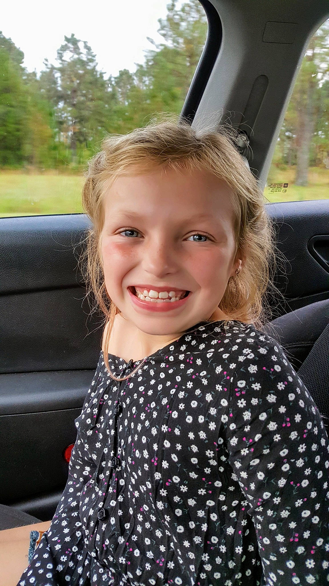 Cami is registered to the contest to win money with this photo: blond, child, child_model, design, eye, face, facial_expression, hair, hairstyle, happy, joy, long_hair, luxury_vehicle, pattern, person, photography, polka_dot, skin, smile, vacation