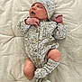 Louis participe au concours pour gagner de l'argent avec cette photo : newborn, baby, sleeping, knitted_hat, knitted_outfit, socks, infant, cute, soft, blanket, cozy, peaceful, resting, portrait, indoors, child, warm, tiny, delicate, comfortable