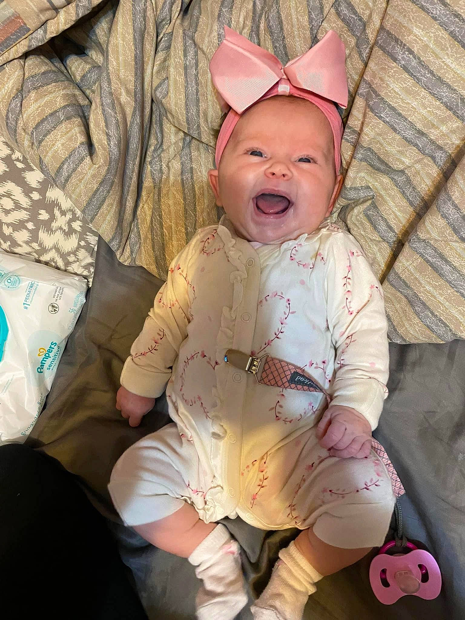 Nevaeh joined the competition — help win amazing prizes! baby, baby_toddler_clothing, cheek, child, comfort, eye, face, glasses, grass, happy, head, mammal, mouth, pattern, person, pink, skin, sleeve, smile, textile