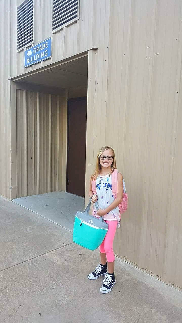 Cheyanne is registered to the contest to win money with this photo: child, electric_blue, footwear, joint, joy, person, pink, shoe, shoulder, style, t_shirt, turquoise, vacation