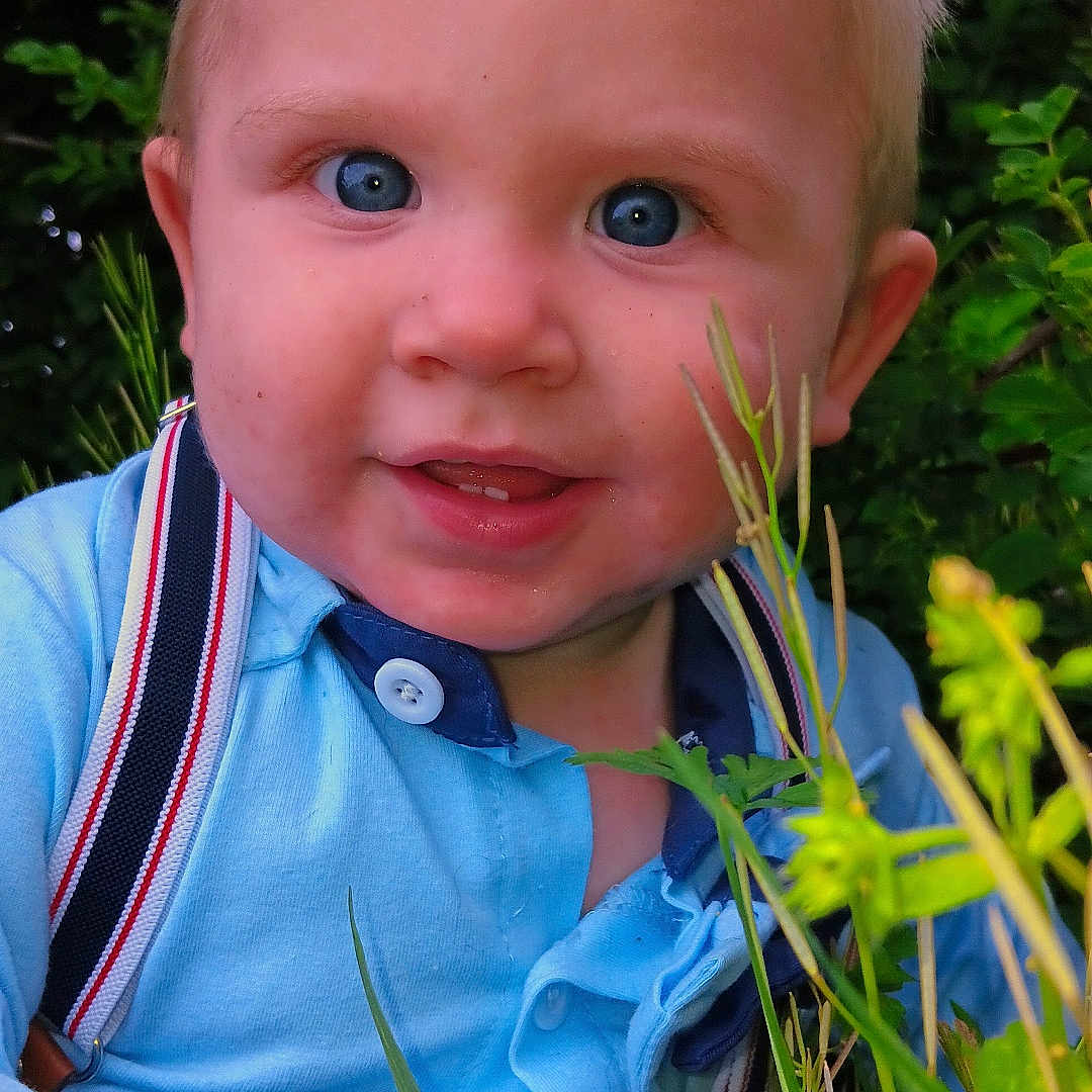 Charles is registered to the contest to win money with this photo: accessories, baby, clothing, face, flower, formalwear, grass, happy, head, herbal, herbs, leaf, outdoors, person, photography, plant, portrait, shirt, smile, tie
