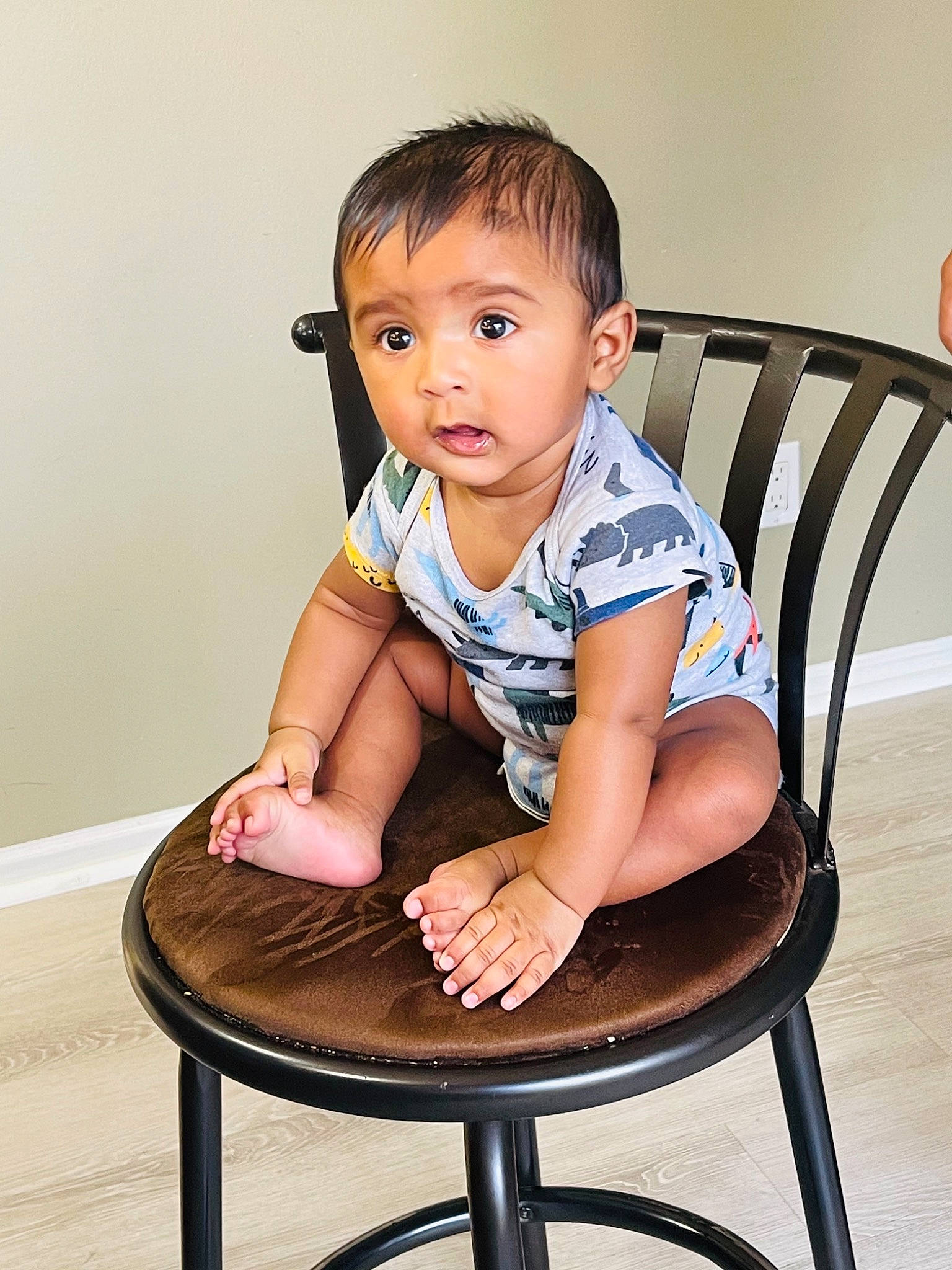 Maahir is registered to the contest to win money with this photo: arm, baby_toddler_clothing, beauty, chair, cheek, child, collar, comfort, flash_photography, flooring, furniture, happy, neck, person, sitting, skin, sleeve, standing, surprise, thigh