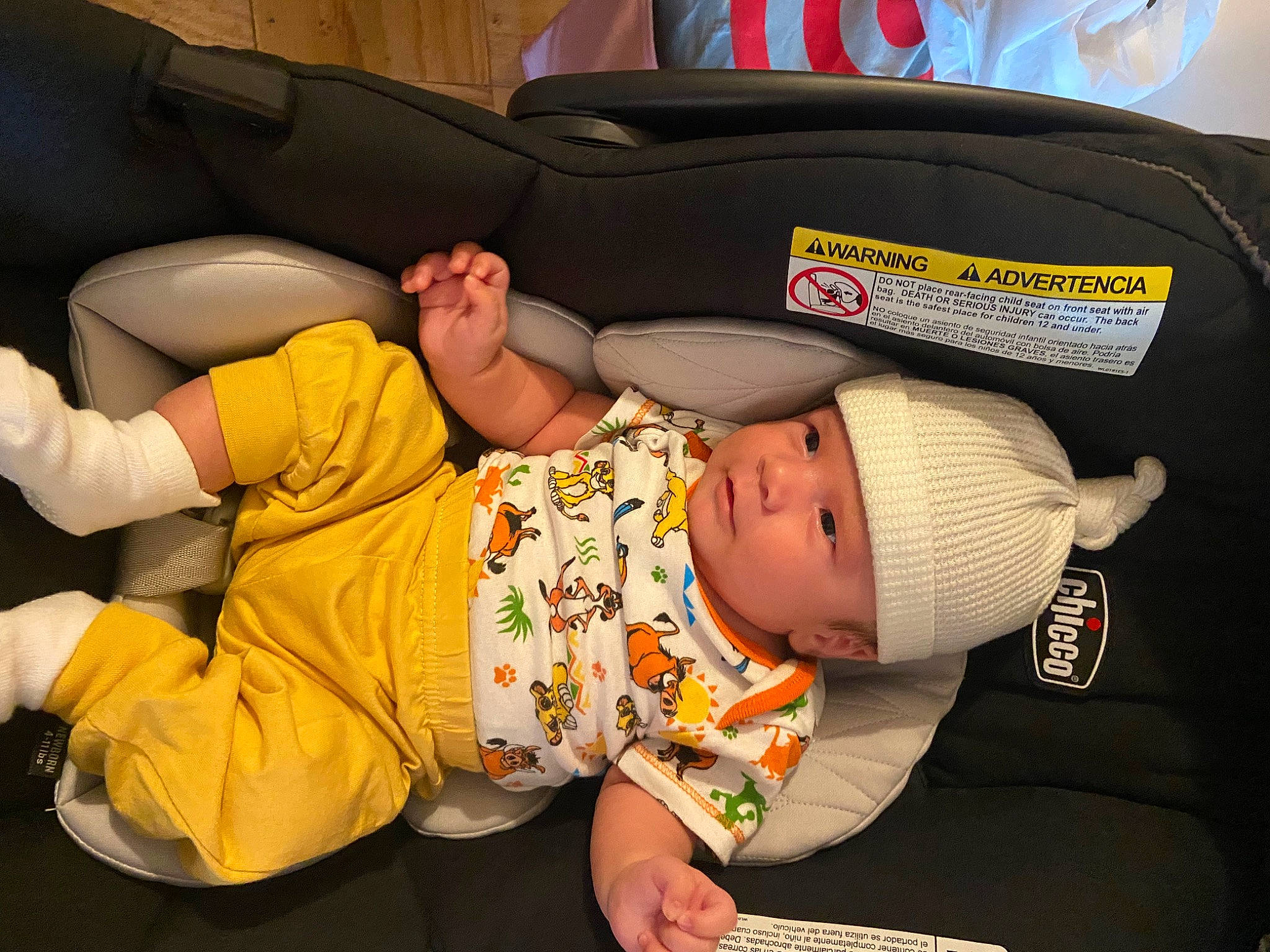 Aaron is registered to the contest to win money with this photo: baby, baby_products, baby_safety, baby_sleeping, baby_toddler_clothing, car_seat, child, comfort, elbow, finger, fun, hat, headwear, knee, lap, nap, person, sitting, sleep, sock