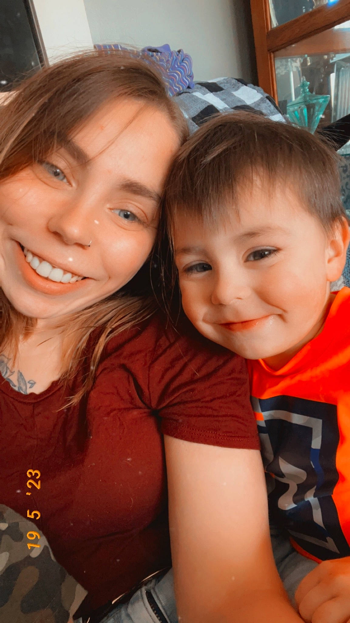 Kayden is registered to the contest to win money with this photo: blond, brown_hair, cheek, child, chin, event, face, fun, happy, head, iris, joy, leisure, mammal, nose, person, sitting, skin, smile, t_shirt