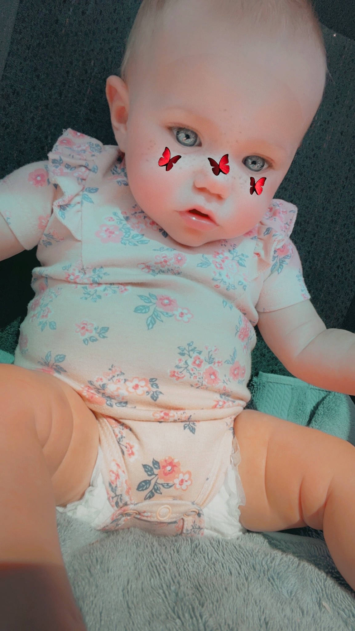 Lylah is registered to the contest to win money with this photo: arm, baby_toddler_clothing, cheek, chin, eye, hand, head, human_body, iris, joint, leg, lip, mouth, muscle, neck, person, pink, skin, sleeve, stomach