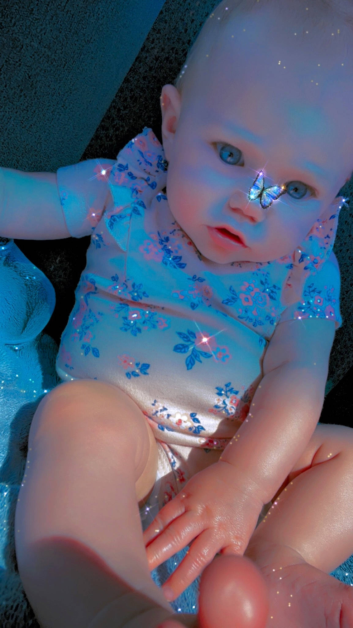 Lylah is registered to the contest to win money with this photo: arm, azure, baby_toddler_clothing, blue, cheek, eye, facial_expression, hand, head, human_body, joint, leg, lip, mouth, muscle, neck, nose, organ, person, shoulder