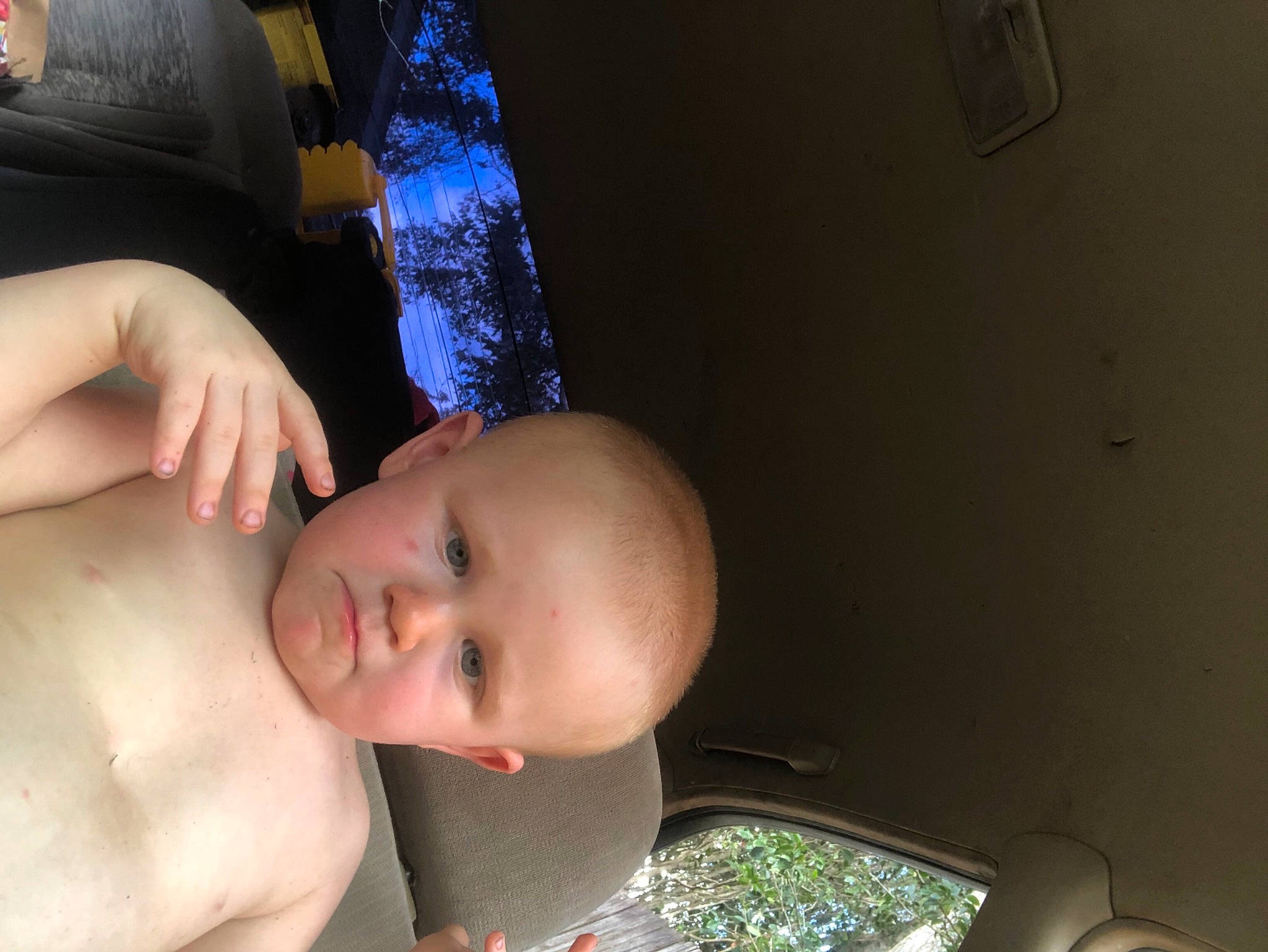 Landon joined the competition — help win amazing prizes! abdomen, arm, baby, black_hair, cheek, chest, eyelash, finger, gesture, grass, hand, happy, human_body, lip, mouth, nose, person, plant, thumb, toddler