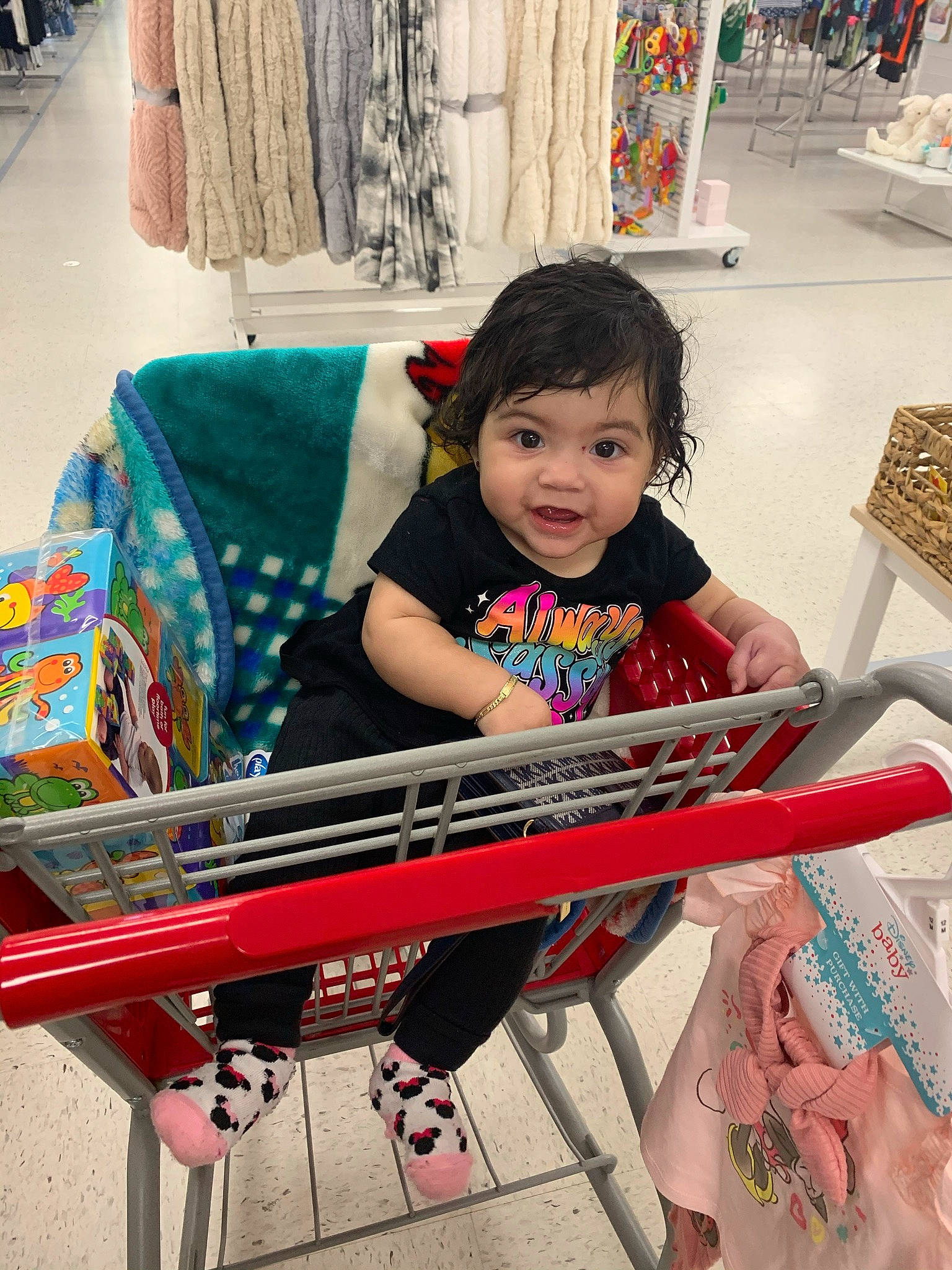 Rebecca Bella joined the competition — help win amazing prizes! baby_toddler_clothing, child, comfort, eye, fun, green, happy, human, leisure, magenta, musical_instrument, musician, outdoor_furniture, person, photograph, public_space, skin, smile, textile, toddler