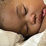 Khalyla is registered to the contest to win money with this photo: child, sleeping, close_up, face, blanket, soft, cozy, peaceful, eyelashes, skin, lips, rest, portrait, indoors, comfort, young, toddler, nap, calm, relaxation