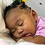 Khalyla joined the competition — help win amazing prizes! child, sleeping, toddler, face, hair, earring, pillow, bed, blanket, cozy, peaceful, rest, indoor, pink_clothing, curly_hair, closeup, portrait, young_child, relaxation, cute