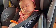 Margaux participe au concours pour gagner de l'argent avec cette photo : baby, car_seat, blanket, sleeping, headband, pink_bow, child, infant, seatbelt, car_interior, toddler, comfort, resting, cute, soft_light, portrait, travel, safety, young_child, peaceful