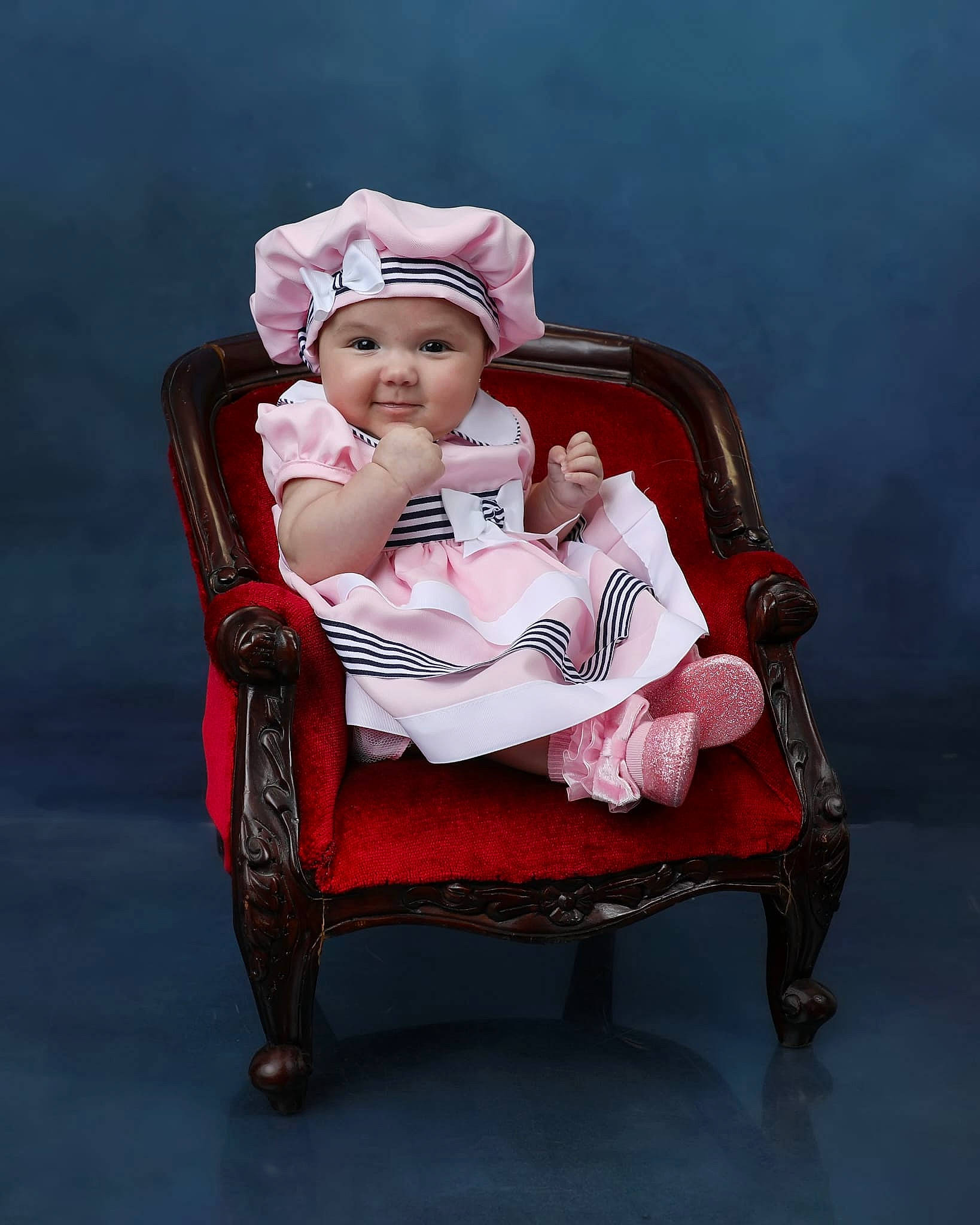 Kaylee joined the competition — help win amazing prizes! baby, baby_carriage, baby_products, baby_toddler_clothing, carmine, chair, child, comfort, event, fashion_accessory, fashion_design, flash_photography, flesh, furniture, headwear, lap, magenta, person, pink, sitting