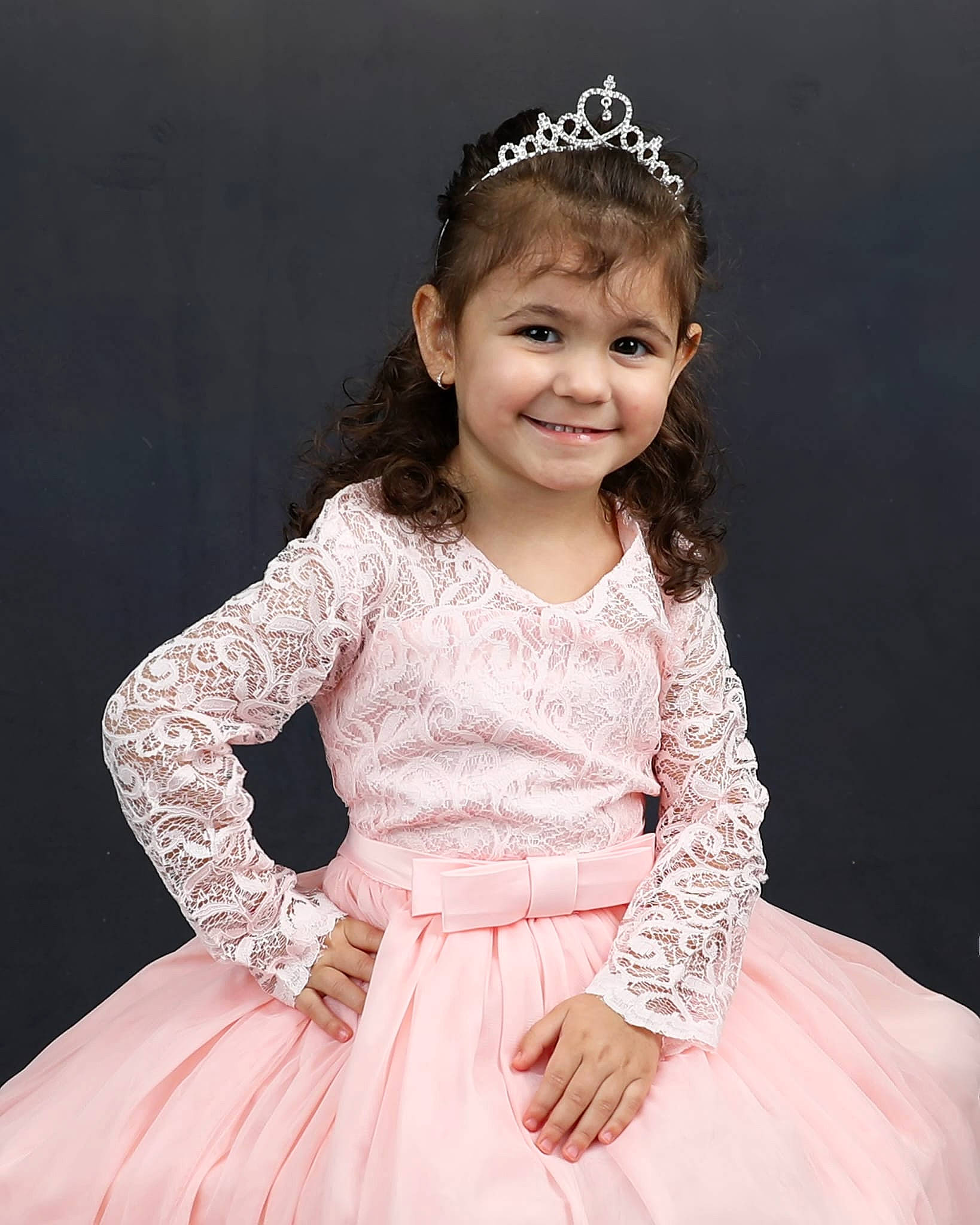 Khloe is registered to the contest to win money with this photo: baby_toddler_clothing, chin, day_dress, dress, embellishment, eye, face, flash_photography, hair, happy, head, headgear, iris, joy, neck, one_piece_garment, person, pink, skin, sleeve