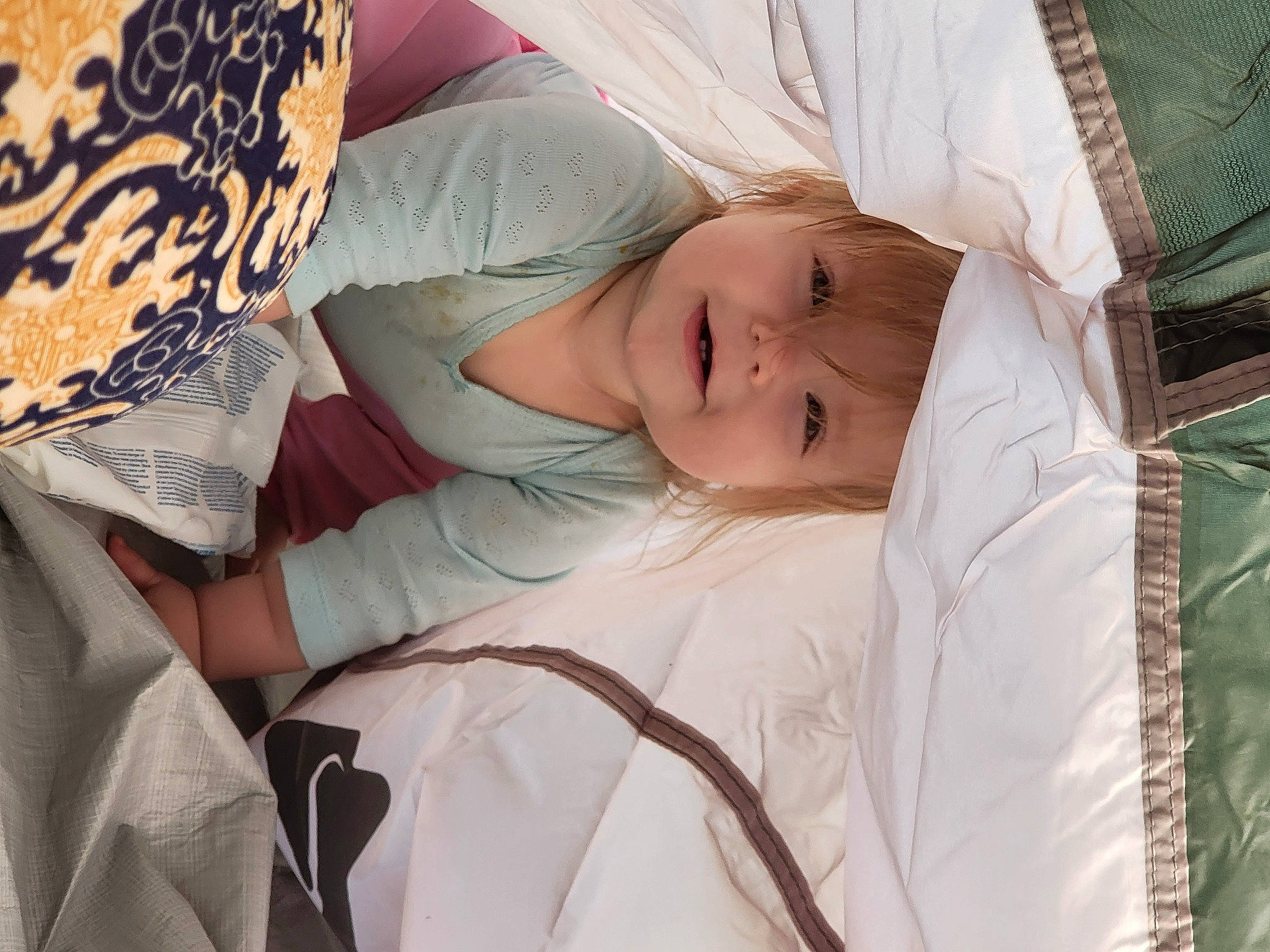 Sable is registered to the contest to win money with this photo: baby, baby_products, baby_sleeping, bedding, bedtime, child, comfort, eyelash, gesture, hand, happy, headwear, human_body, joy, linens, nap, pattern, person, room, skin