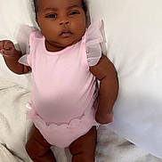 Eislyn joined the competition — help win amazing prizes! adorable, baby, baby_girl, blanket, child, cute, indoors, infant, lying_down, newborn, one_person, peaceful, pink_clothing, portrait, resting, skin, sleepwear, small_hands, sock, soft_texture