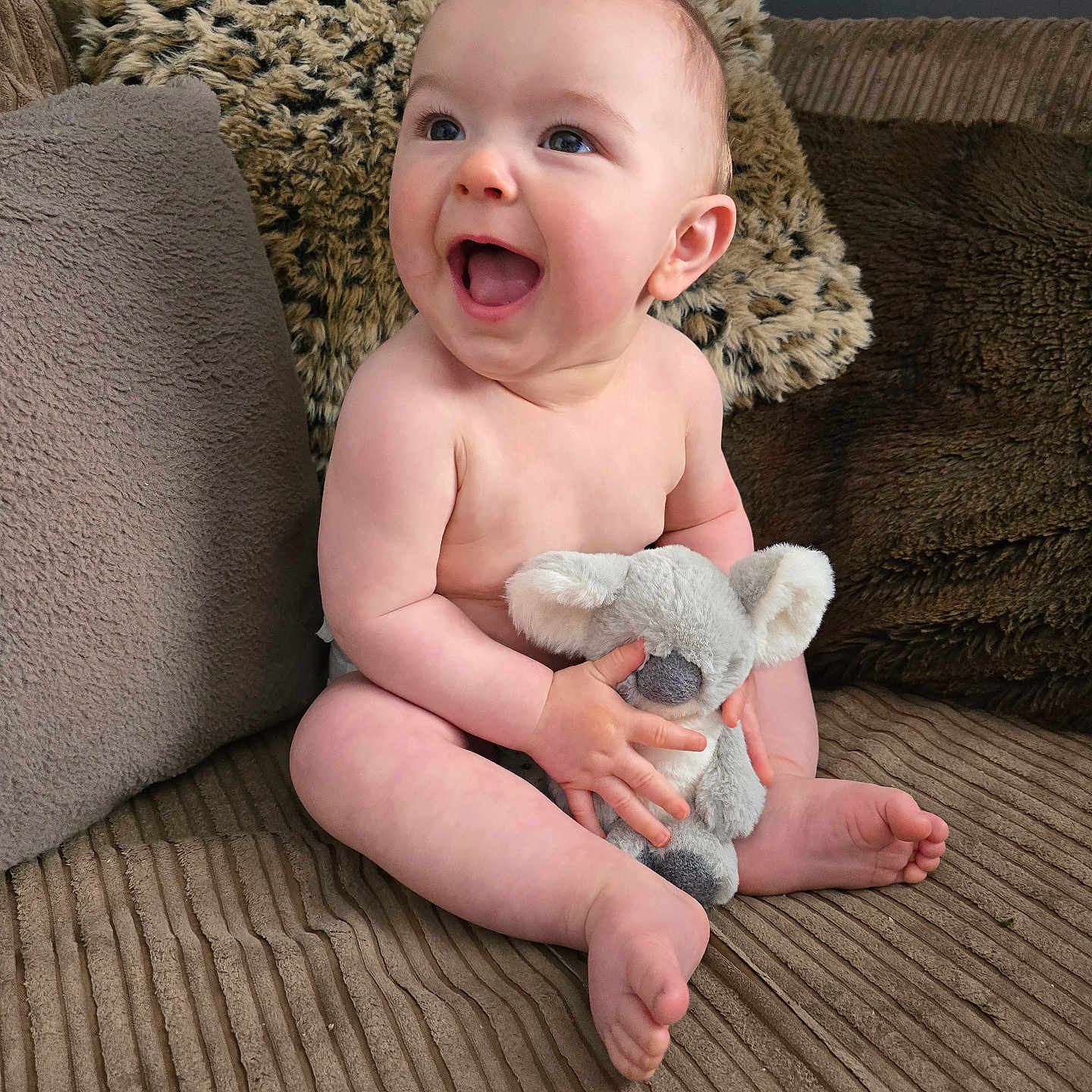 Luca is registered to the contest to win money with this photo: baby, babylaughing, bodypart, chair, couch, cushion, face, finger, furniture, hand, happy, head, homedecor, laughing, newborn, person, photography, portrait, sitting, smile