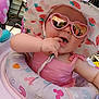 Jolie joined the competition — help win amazing prizes! baby, child, pink, hat, sunglasses, heart_shaped, outdoor, walker, cushion, toy, sunlight, smiling, fingers, summer, reflection, playful, cute, dress, person, infant