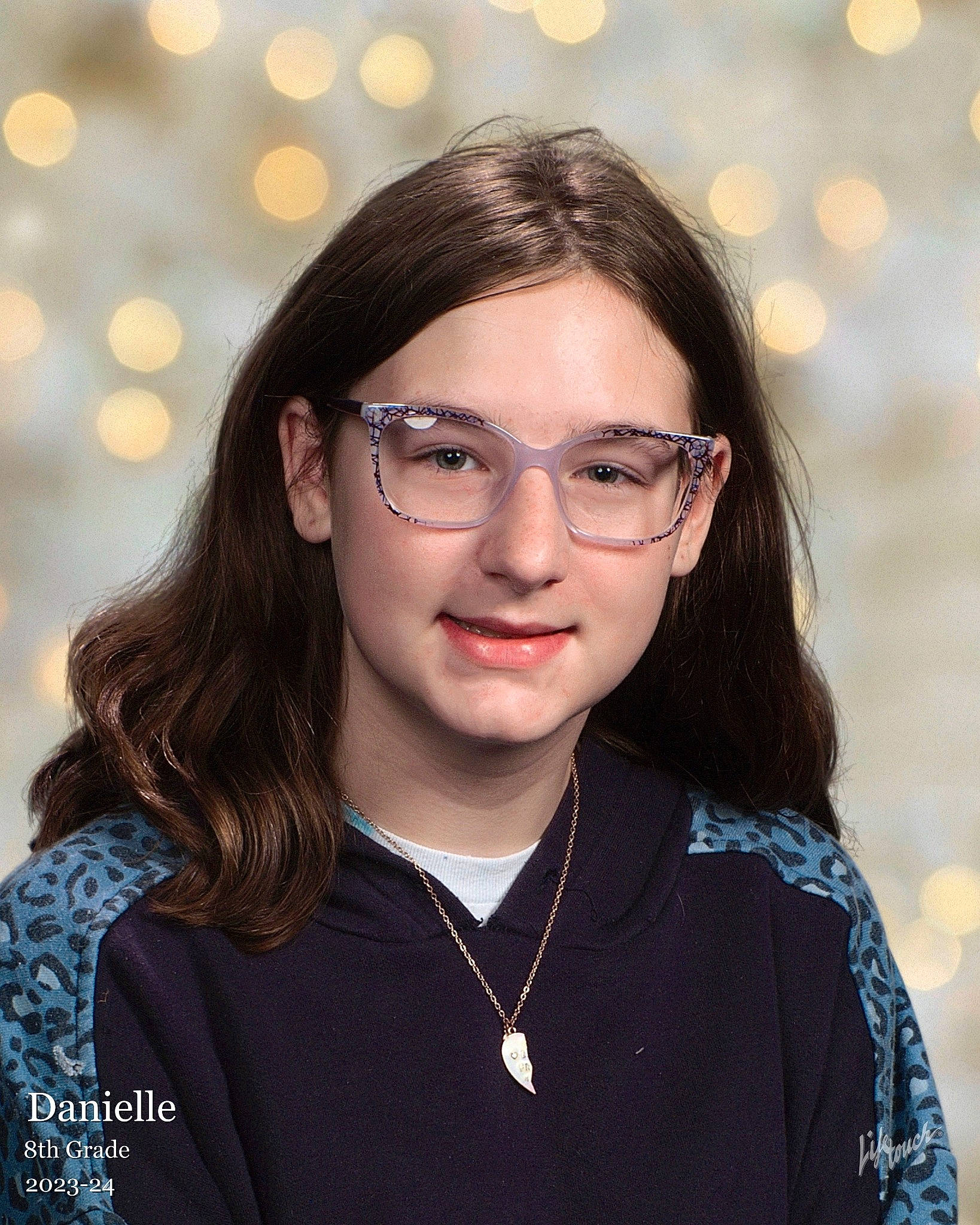 Danielle is registered to the contest to win money with this photo: black_hair, brown_hair, cheek, chin, cool, eyebrow, eyewear, face, flash_photography, forehead, fun, glasses, happy, lip, long_hair, person, skin, sleeve, smile, standing