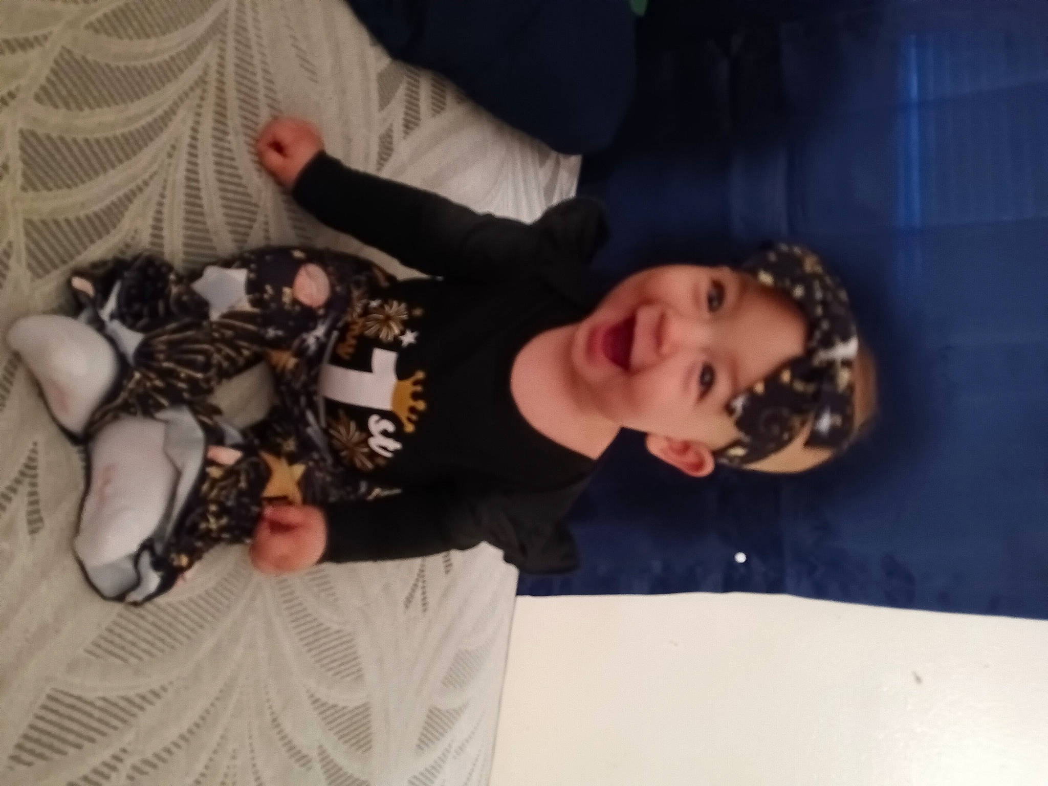 Violet is registered to the contest to win money with this photo: child, event, flash_photography, food, fun, hat, headwear, joy, nail, pattern, person, plant, python, reptile, room, serpent, snake, t_shirt, tree, wrist