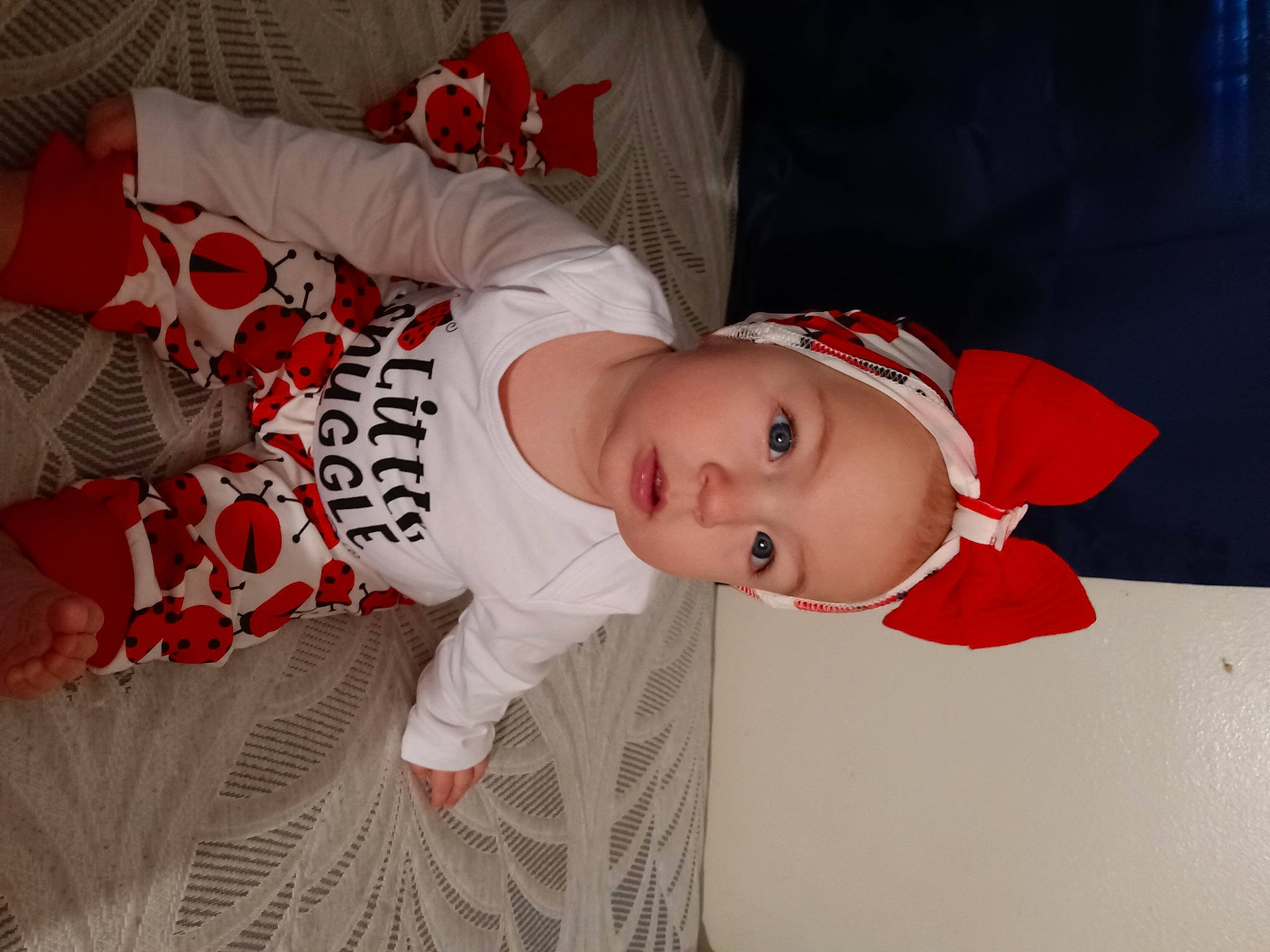 Violet joined the competition — help win amazing prizes! baby, baby_toddler_clothing, carmine, child, comfort, elbow, face, hat, headgear, mouth, pattern, person, sleeve, smile, toddler