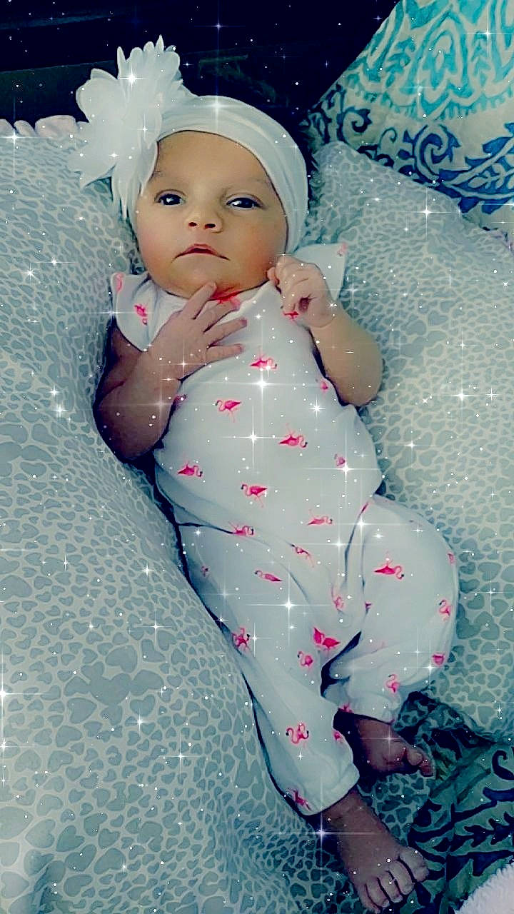 Carolyn joined the competition — help win amazing prizes! baby, cheek, child, doll, headwear, person, pink, skin, toddler, toy