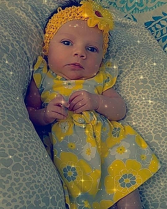 Carolyn joined the competition — help win amazing prizes! baby, child, headwear, iris, person, smile, toddler, yellow