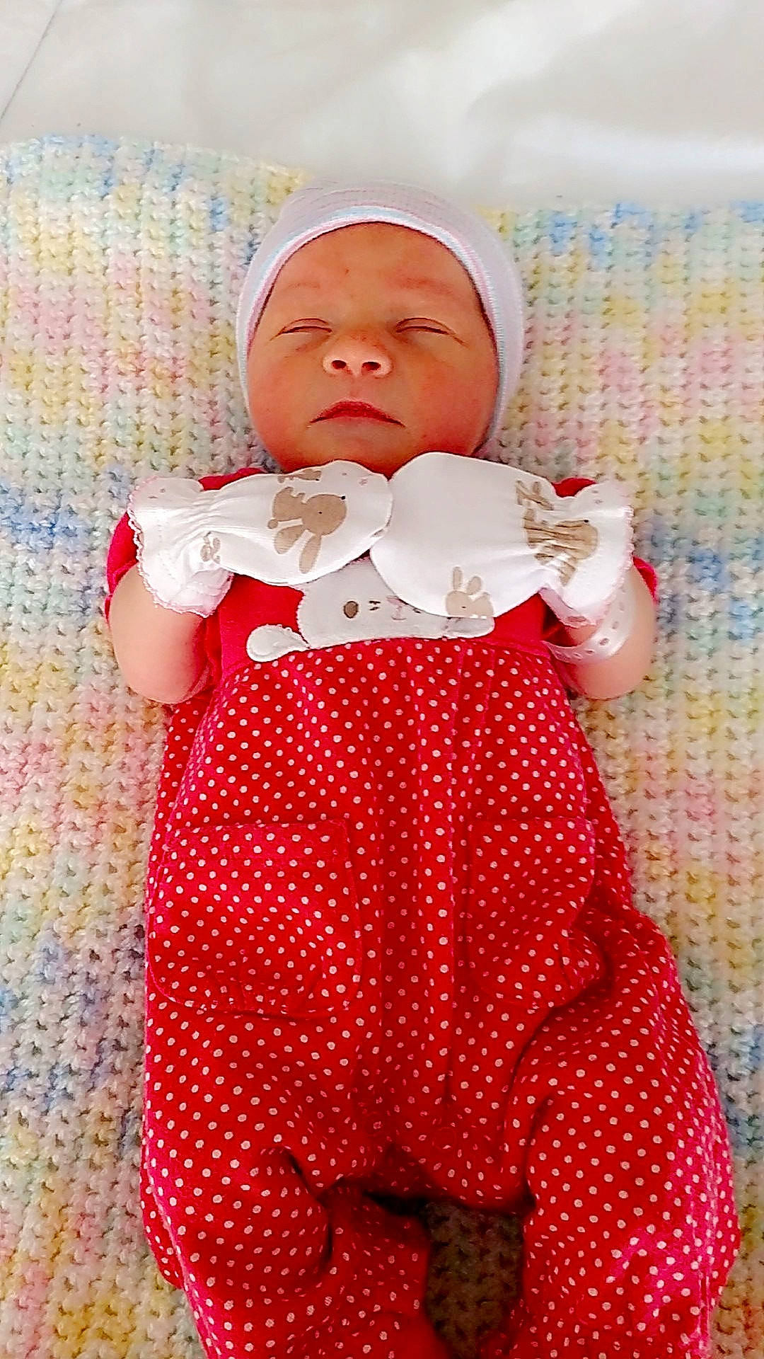 Carolyn is registered to the contest to win money with this photo: baby, baby_toddler_clothing, child, design, headwear, pattern, person, polka_dot, red, skin, toddler