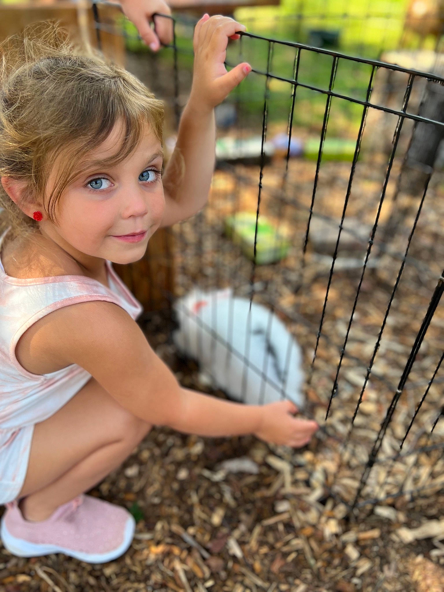 Oaklee is registered to the contest to win money with this photo: botany, child, fawn, fence, fun, grass, grass_family, happy, joy, leaf, leisure, people_in_nature, person, plant, play, recreation, smile, soil, t_shirt, thumb