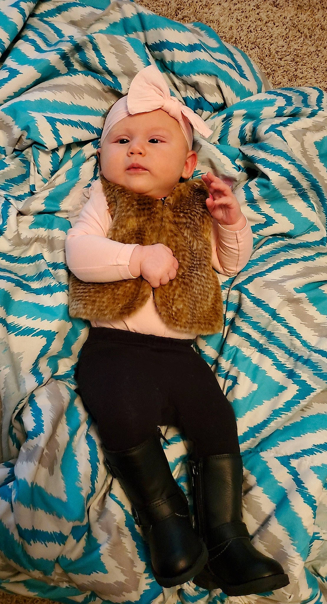 Joslyn is registered to the contest to win money with this photo: baby, blond, blue, child, costume, fawn, fur, headwear, long_hair, person, skin, toddler, turquoise